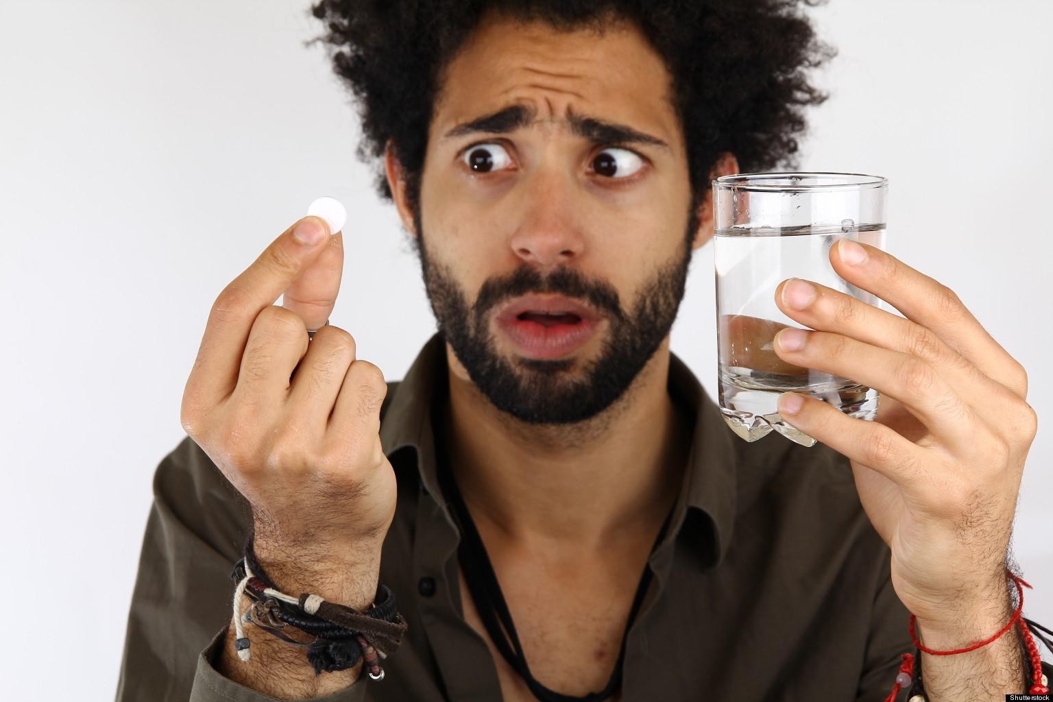 man with pill